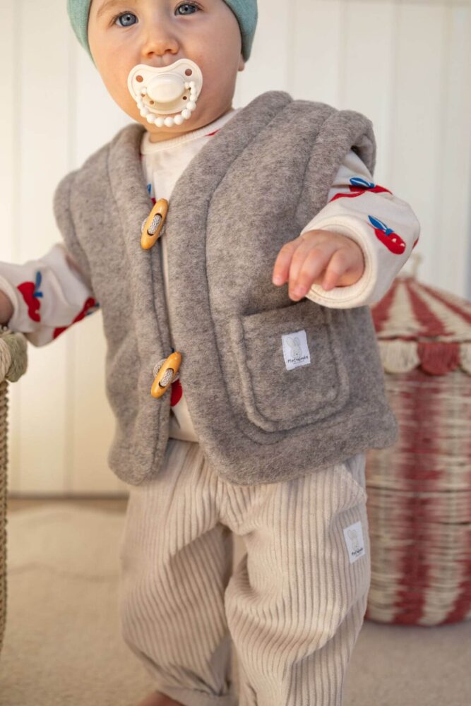 Kamizelka dziecięca z wełny merino szaro-beżowy melanż