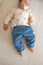 Spodnie dziecięce bawełniane sztruksowe ciemny niebieski